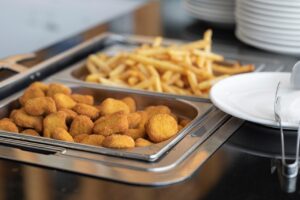 chicken nuggets, nuggets, french fries, fries, nuggets and fries, tongs, chafing dish, buffet, food, restaurant, buffet restaurant, delicious, fried foods, deep fried foods, chicken nuggets, chicken nuggets, chicken nuggets, chicken nuggets, chicken nuggets, nuggets